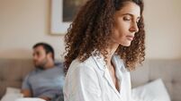 Upset, bedroom and woman in argument with her husband for divorce, marriage problem or breakup. Sad, depression and female perso