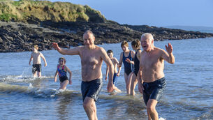 Watch: Tánaiste Micheál Martin joins Courtmacsherry's New Year's swim