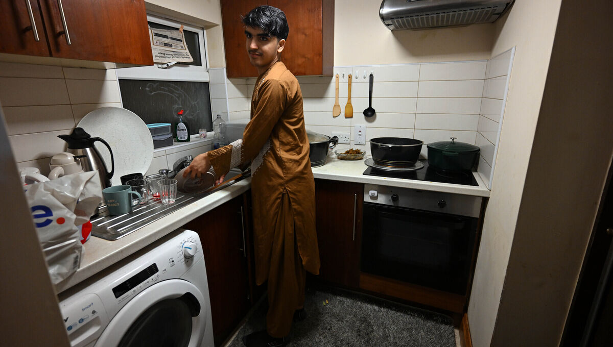 Afterwards, Samiullah washes up the dishes as part of is daily routine during the holy month. Picture: Ray Ryan Afterwards, Samiullah washes up the dishes as part of is daily routine during the holy month. Picture: Ray Ryan