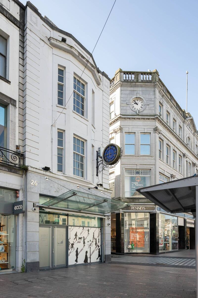 The Patrick Street entrance of the total 11,650 sq ft property previously occupied by AIB, incorporating expansive retail space plus a large enclosed, secure yard with vehicular access via Robert Street, the street adjacent to Penney’s. The Patrick Street entrance of the total 11,650 sq ft property previously occupied by AIB, incorporating expansive retail space plus a large enclosed, secure yard with vehicular access via Robert Street, the street adjacent to Penney’s.